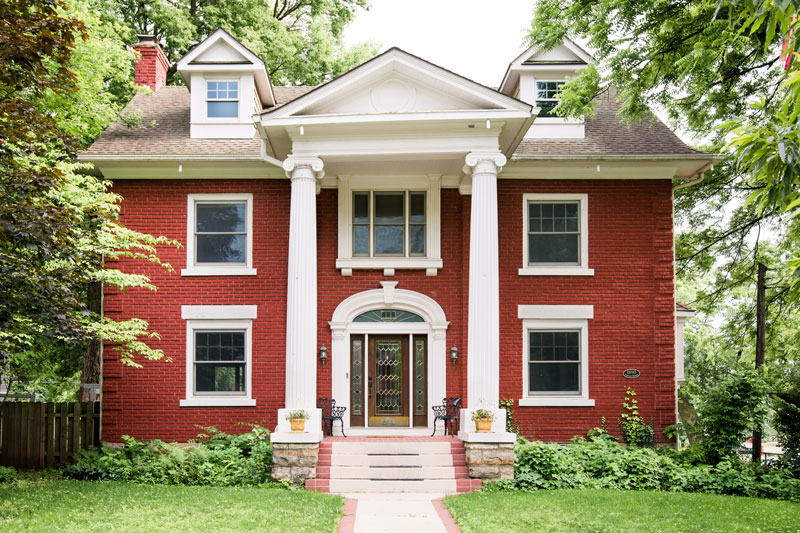 Brick colonial house protected by home insurance in New Haven